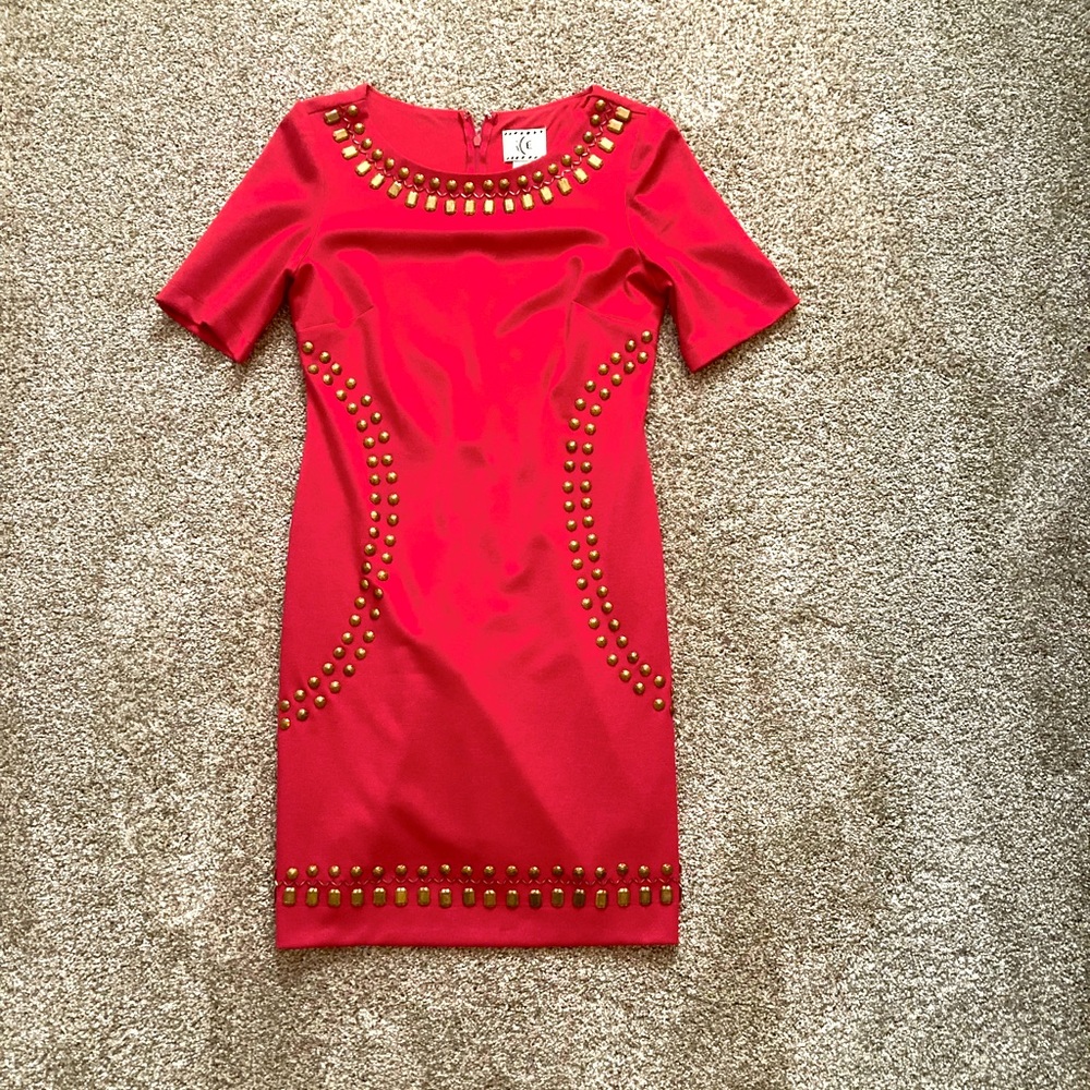 Red mini dress with gold like gems.